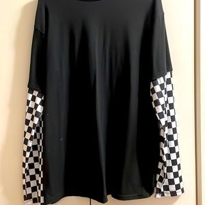 Black shirt with checkered sleeves